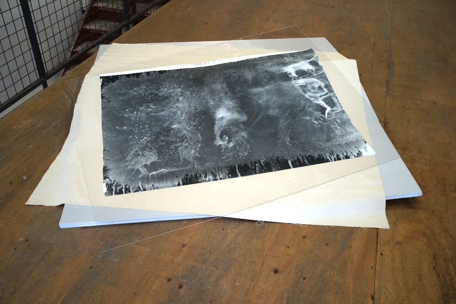 Joy Episalla, *Aerial View 3*, 2015. Silver gelatin photogram on fiber-based paper, canvas, plexiglass, styrofoam