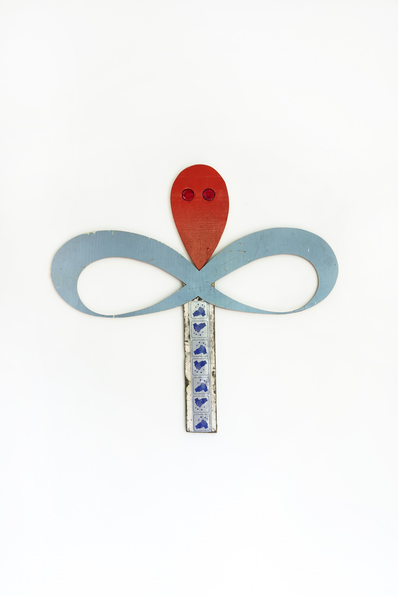 Michael Lazarus, *red & blue*, 2013. Paint, wood, adhesive lettering, plastic reflectors 
