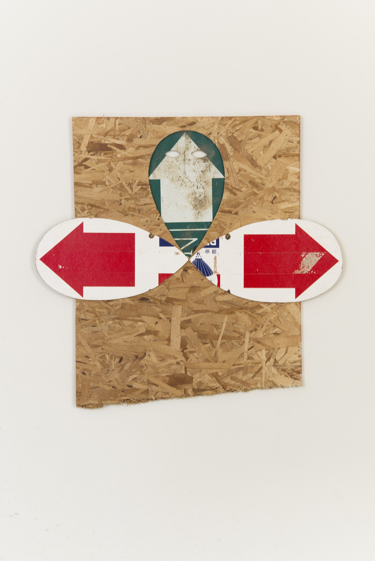Michael Lazarus, *no title (arrows)*, 2014. Found signage and wood 