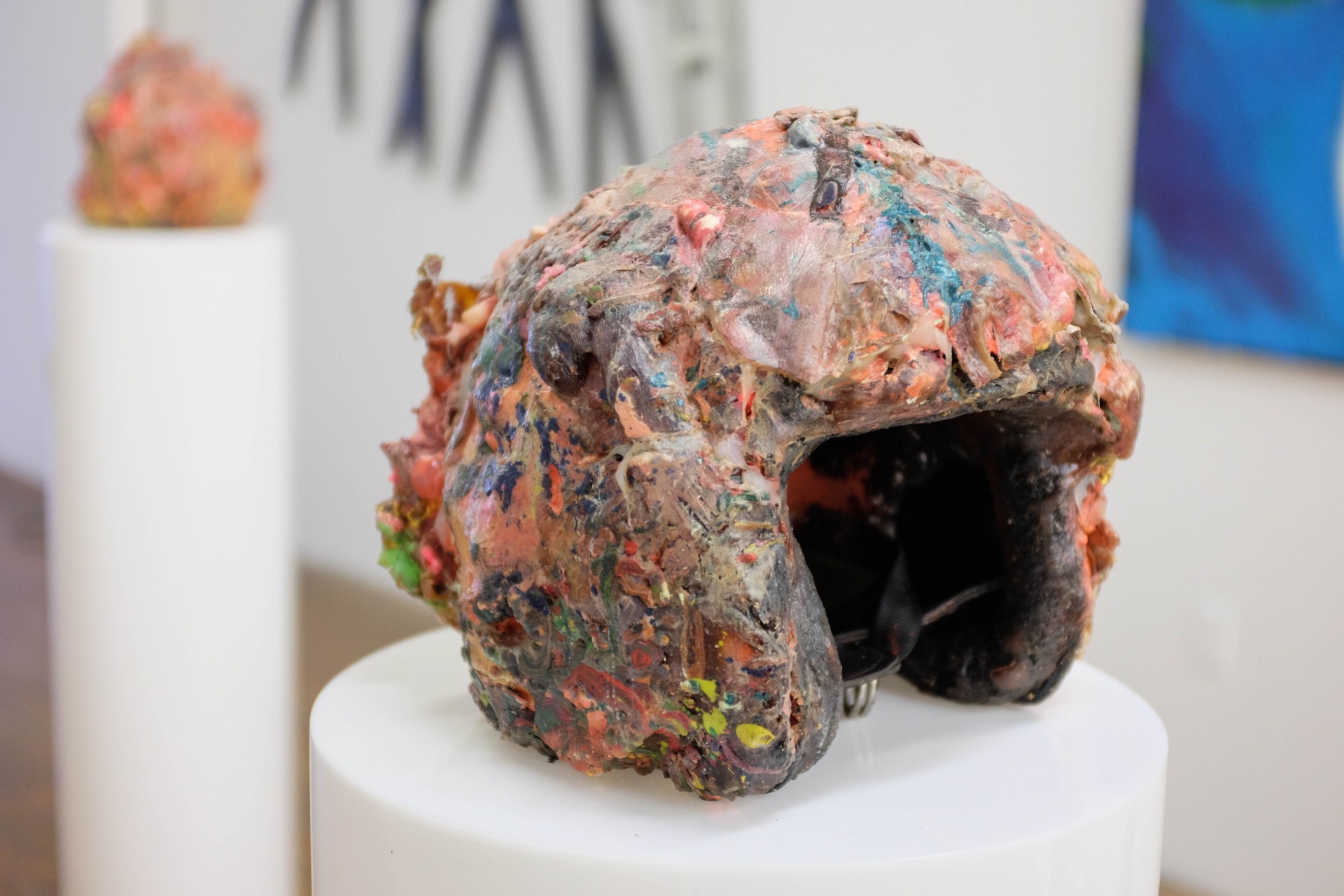 Aimee Goguen, *face hat*, 2010. Gummy bears, balloons, crayon, acrylic, neon foam, plaster, plastic latex, sticks