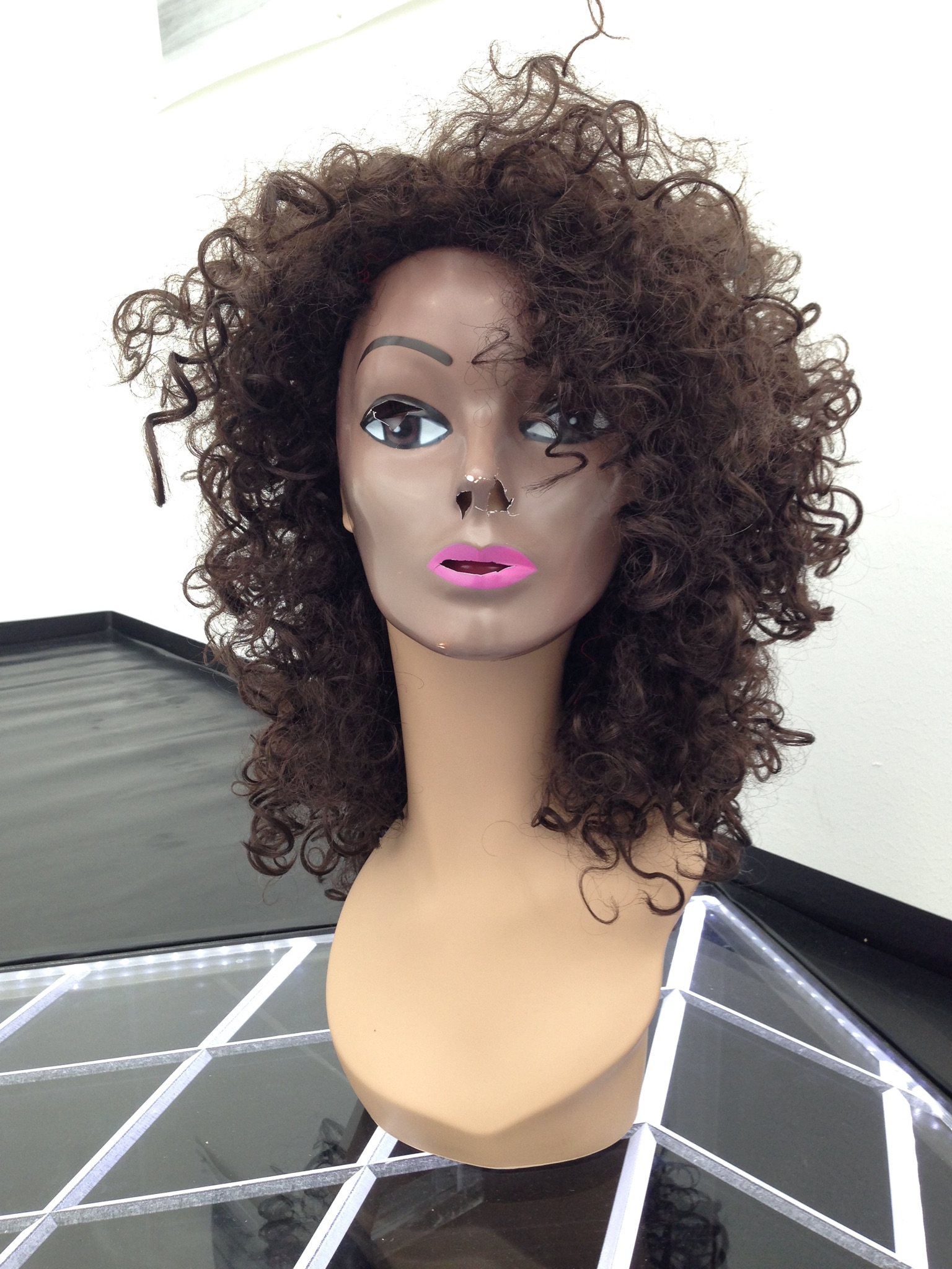 Narcissister. *Bust 1 (Black Mask)*, 2015. Plastic mask, fiberglass wig form, wig