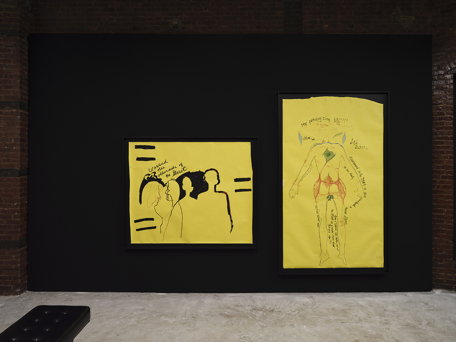 Chloe Dzublio, The Prince George Drawings, curated by Alex Fleming and Nia Nottage, installation view at Participant Inc, NYC, pictured (right to left): *Untitled (Stop Pathologizing Me)*, 2011, paint marker, colored pencil, ink on craft paper, and Chloe Dzubilo & T De Long, *Untitled (Crossed the Street)*, 2010, black Paint Marker on craft paper. Photos by Studio Kukla