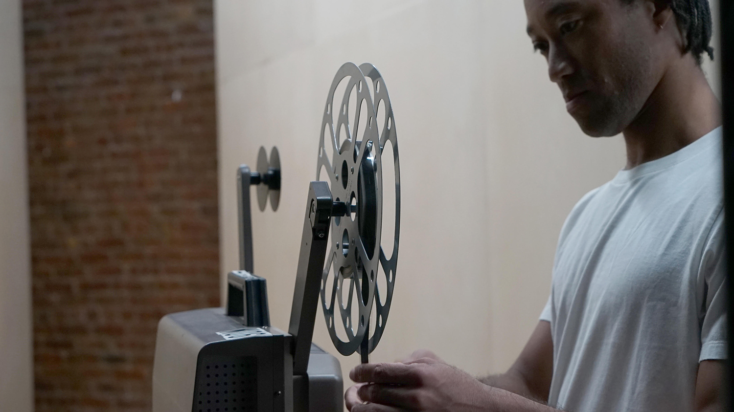 Jimmy Robert, *Object/My affection*, Super-8 transferred to 16mm, black & white, silent, 3:00 minutes. Sheetrock and plywood walls, dimensions variable. Performed by Raymond Pinto, Photo: Itziar Barrio