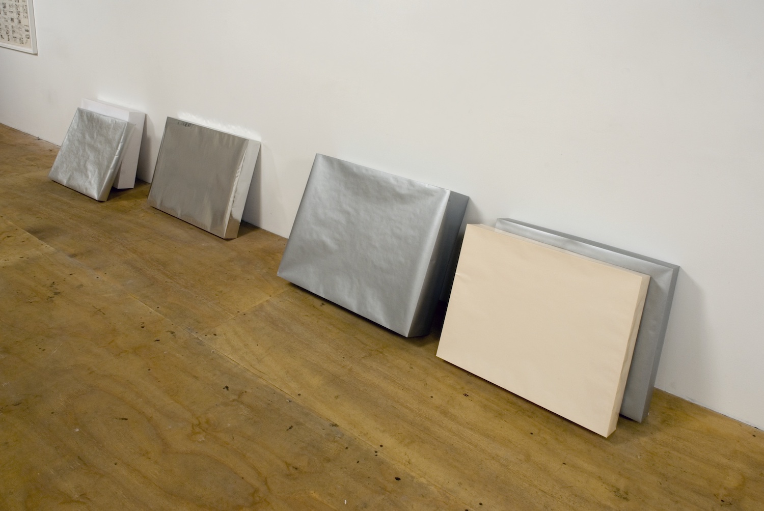 Stefanie Victor, *Untitled (boxes)*, 2009. Gift-wrap, tape